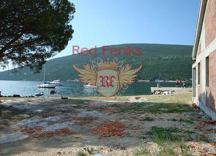 Участок с собственным пляжем и пирсом на первой линии в Дженовичах, Земля в Херцег Нови Черногория